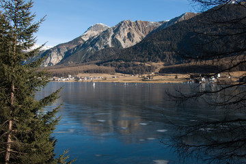 Frozen Haidersee (lake) St. Valentin, Vinschgau, South Tyrol, Italy