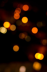 Christmas festive abstract holidays background with bokeh defocused lights and stars