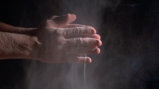 10816 baker clapping with flour powder in hands slow motion
