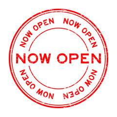 Grunge red now open round rubber stamp on white background