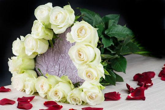 bouquet of white roses in the shape of heart