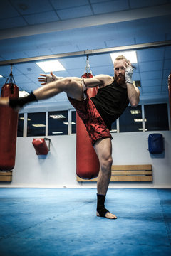 Fighter Shadowboxing At Gym