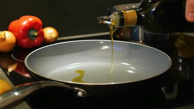 Pour olive oil into a pan