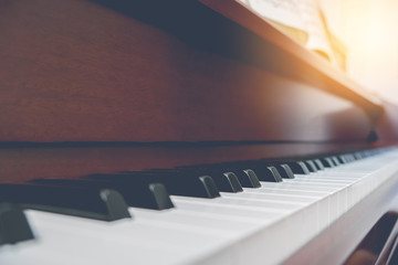 Piano keyboard background with selective focus. vintge filter