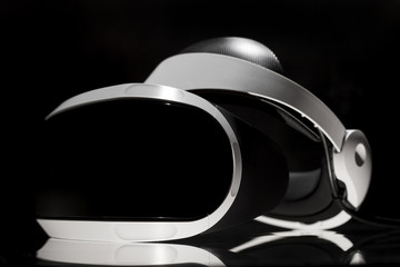 Virtual reality glasses on black background.