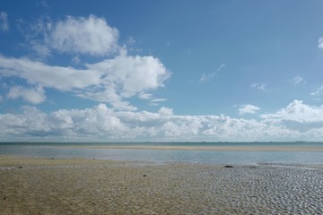 Obraz premium Wolken über dem Wattenmeer