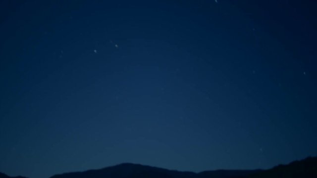 Beautiful time lapse stock footage of stars passing over Himalayan mountains at night, Sikkim, India. Night video with HD, 1920 x 1020 quality, nature scene.
