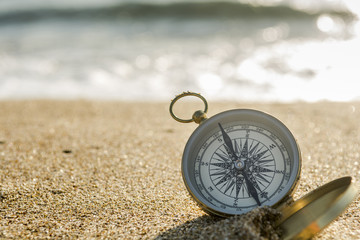 Compass on the beach