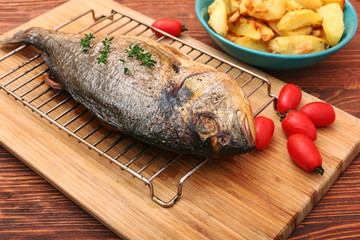 Whole fried dorado fish
