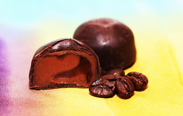 Chocolate candies and coffee beans