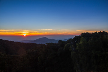 Landscape of sunrise over misty mountains in the morning at Chia