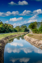 Irrigation canal with blue sky