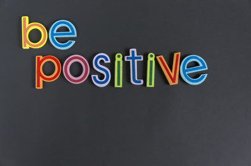 Be positive, do not negative, colorful words on blackboard