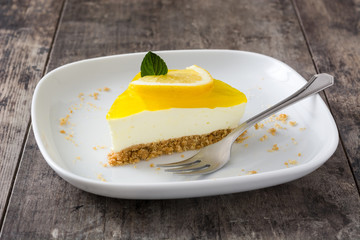 Lemon pie on wooden background
