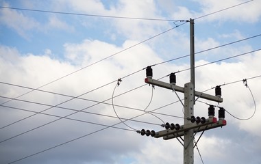 Low-voltage power poles and transmission line junctions with equipment