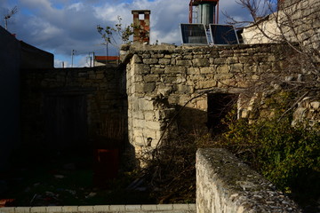 Fototapeta na wymiar The old stone ruined house in Dora village, Cyprus