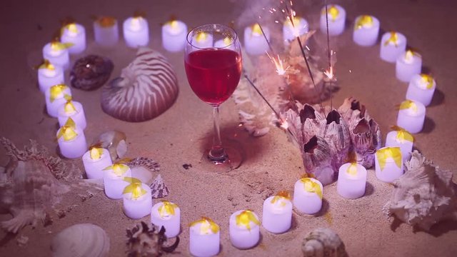 celebration on the beach enjoy with a drink inside  candle heart