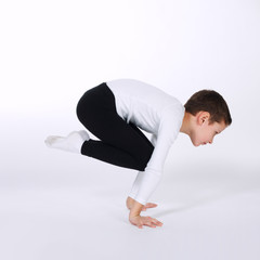 young gymnast on white background