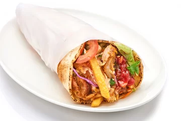 Keuken spatwand met foto shawarma with sauce on white background.. © catalineremia