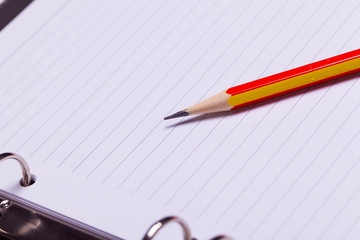 Pencil and note, to do list, reminder.