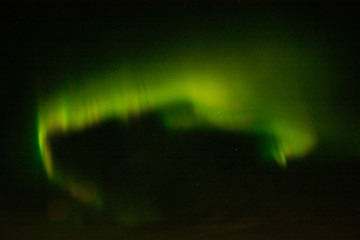 Multi-colored luminescence of the night sky in the northern region.
