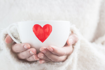 Woman hold cup of love , people, relationship and love concept