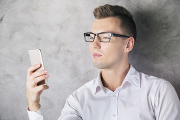 Caucasian man using cell phone