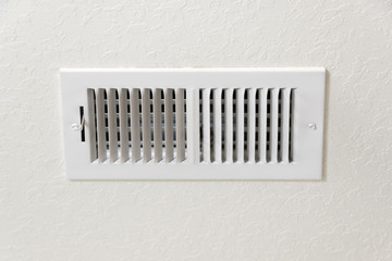 Air Conditioning Vent In Textured Wall Background With Copy Space