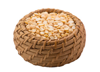 Yellow peas in a basket on a white background