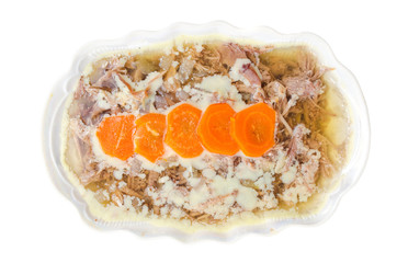 food duck meat in jelly with vegetables orange carrot on a white background