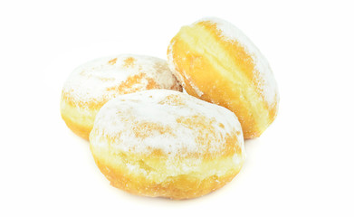 A pile of fresh jam filled doughnuts on a white background