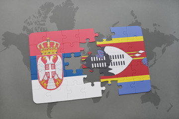 puzzle with the national flag of serbia and swaziland on a world map