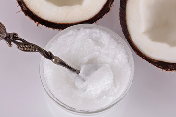 Coconut and coconut oil on white background