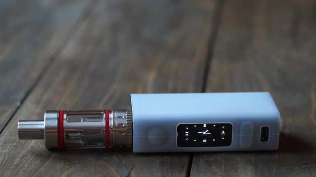 thick smoke lay down on the e-cigarette