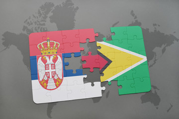 puzzle with the national flag of serbia and guyana on a world map