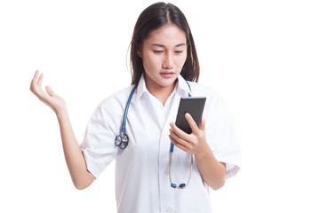 Asian young doctor woman upset with  mobile phone.