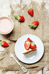 Carrot cake decorated with strawberries