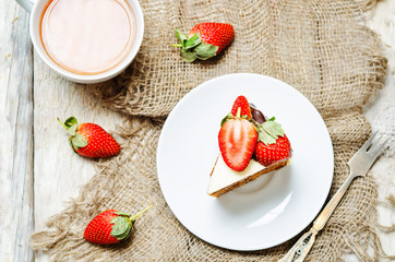 Carrot cake decorated with strawberries
