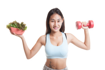 Beautiful Asian healthy girl with dumbbell and salad.