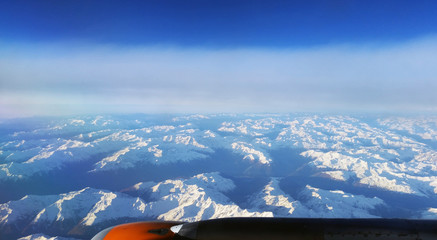 Naklejka na ściany i meble Alps - view from plane