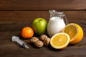 concept food allergies on wooden background