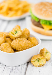 Cheese Nuggets (with Chilis) (selective focus, close-up shot)