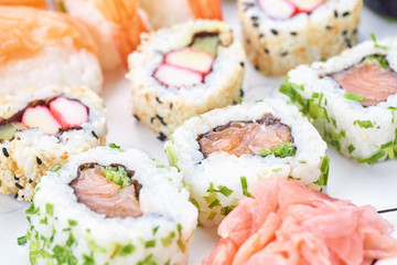 Sushi set on a white table