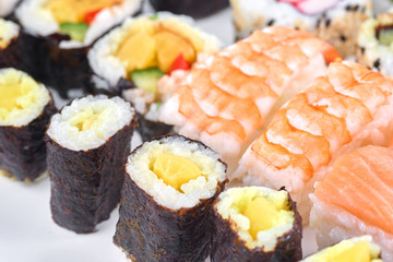 Sushi set on a white table
