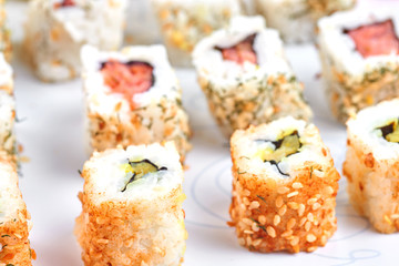 Sushi set on a white table