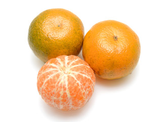 peeled tangerine, clementine or mandarin orange fruit isolated on white background