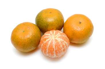 peeled tangerine, clementine or mandarin orange fruit isolated on white background