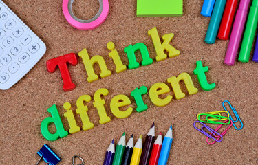 Think different words on cork background