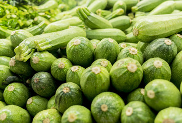 Fresh green zucchini background pattern

