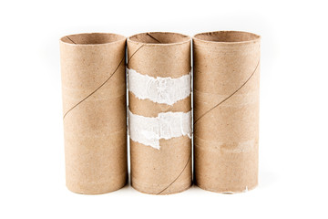 Several empty toilet paper rolls isolated on a white background